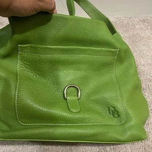 Beautiful green Dooney & Bourke waiting for its new home.
